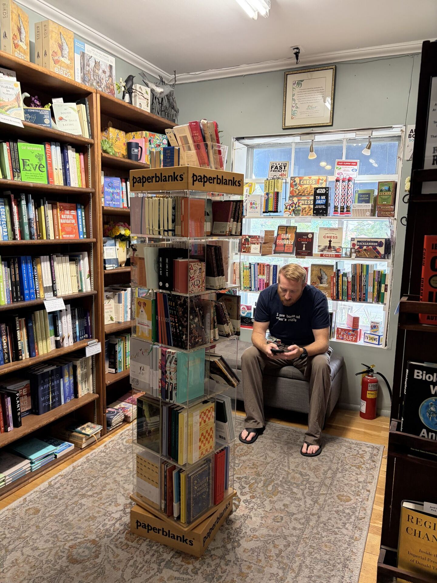 Man reading inside a bookstore
